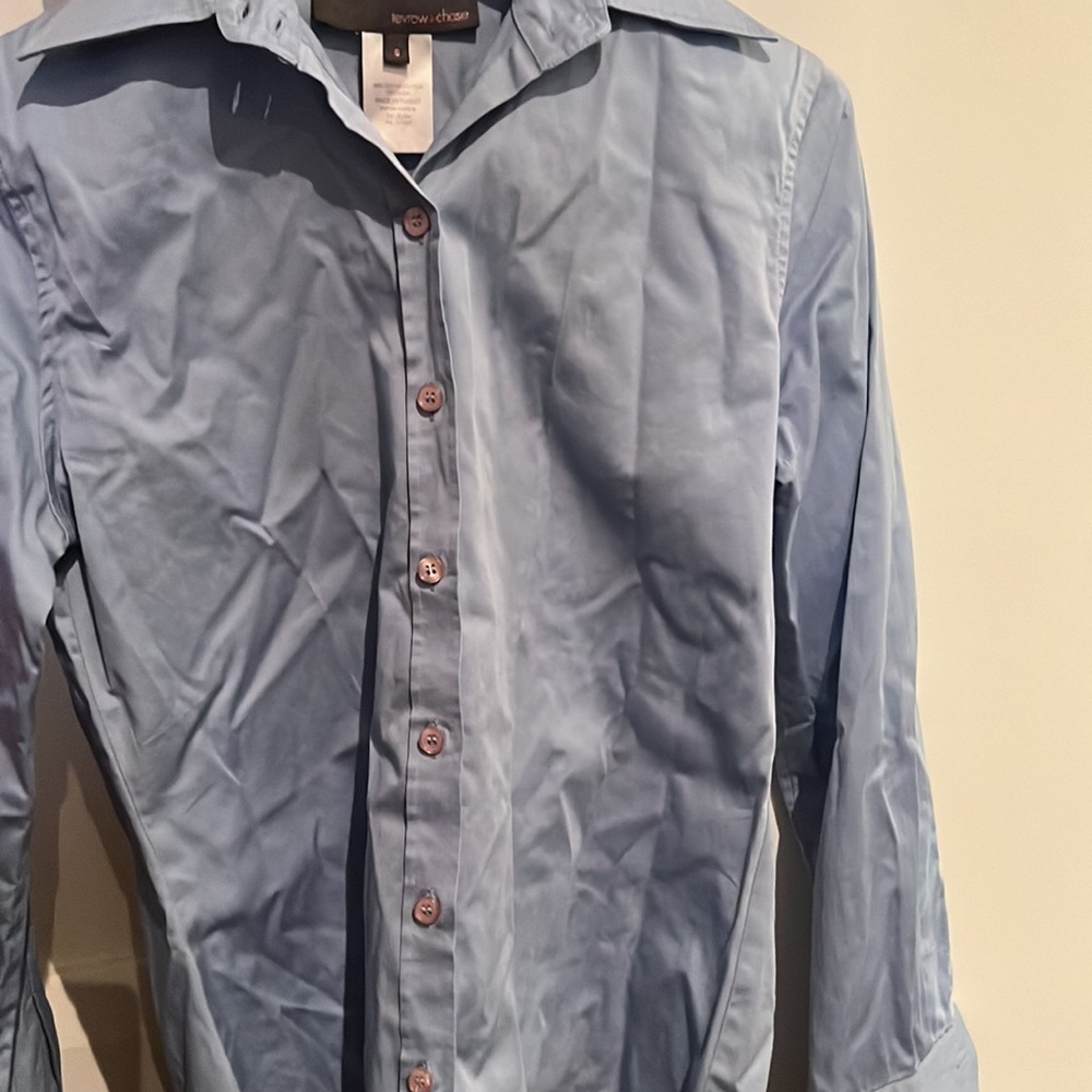 Blue blouse. Size small. Would best fit a size 4.